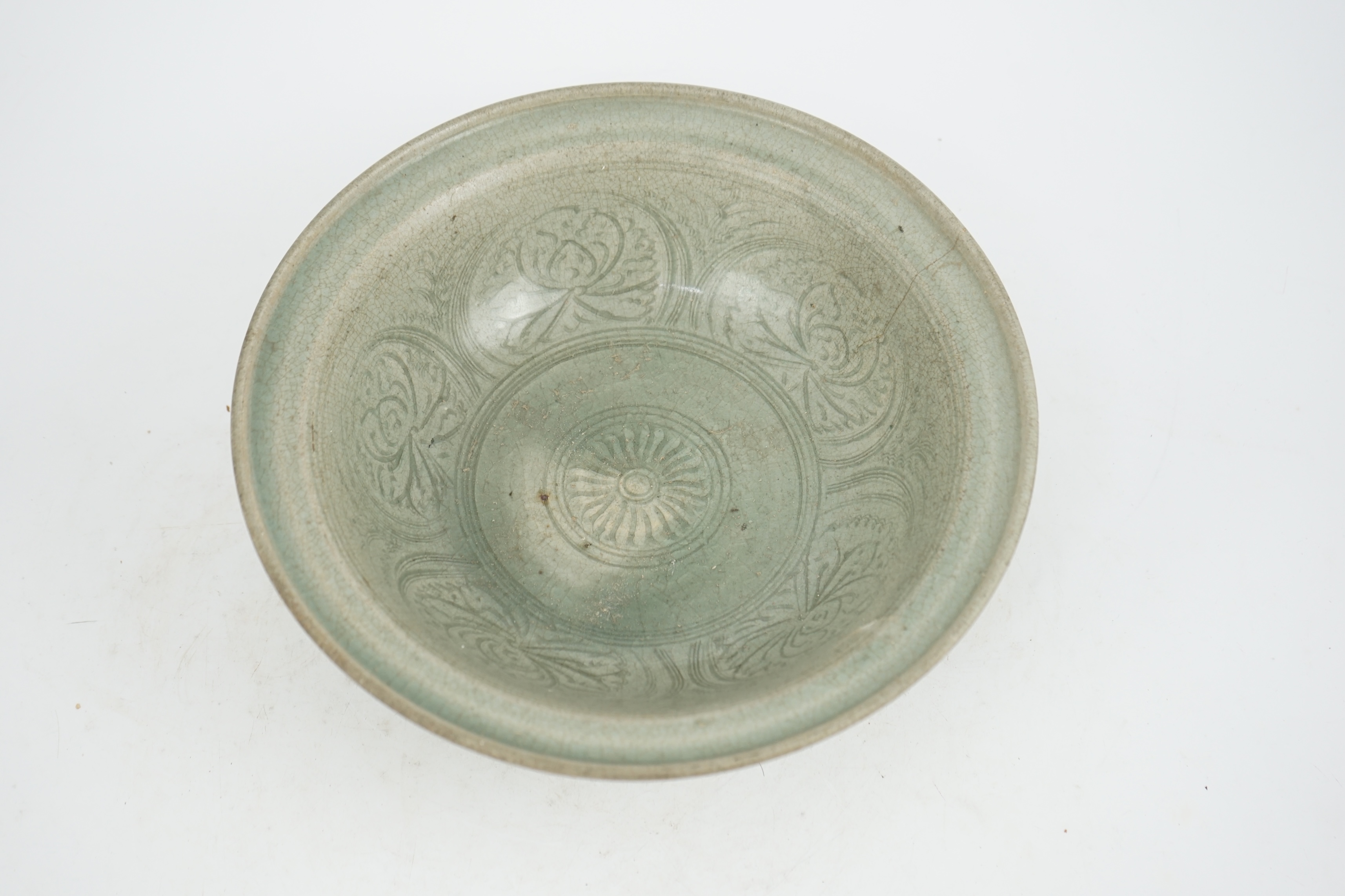 A large Thai celadon glazed bowl, Sawankhalok kilns, 14th / 15th century